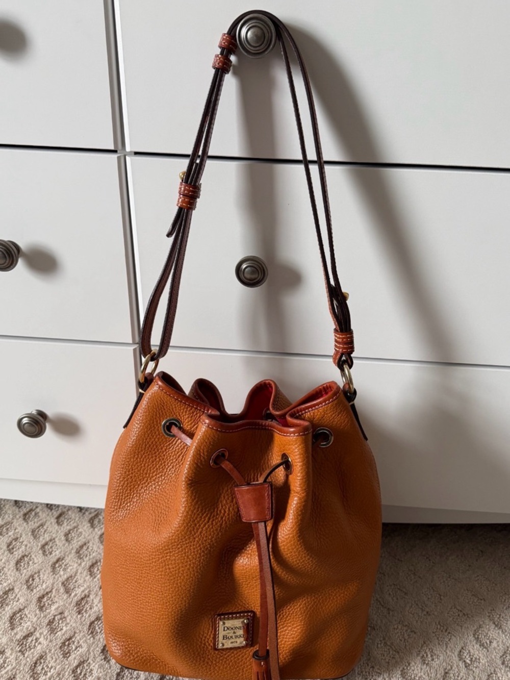 Dooney & Bourke Orange Pebbled Leather Drawstring Bucket Bag
